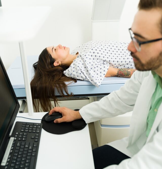 woman undergoing bone density testing in Silver Spring